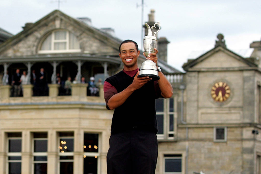 Tiger Woods lifts the Claret Jug after winning The Open at St Andrews in 2005